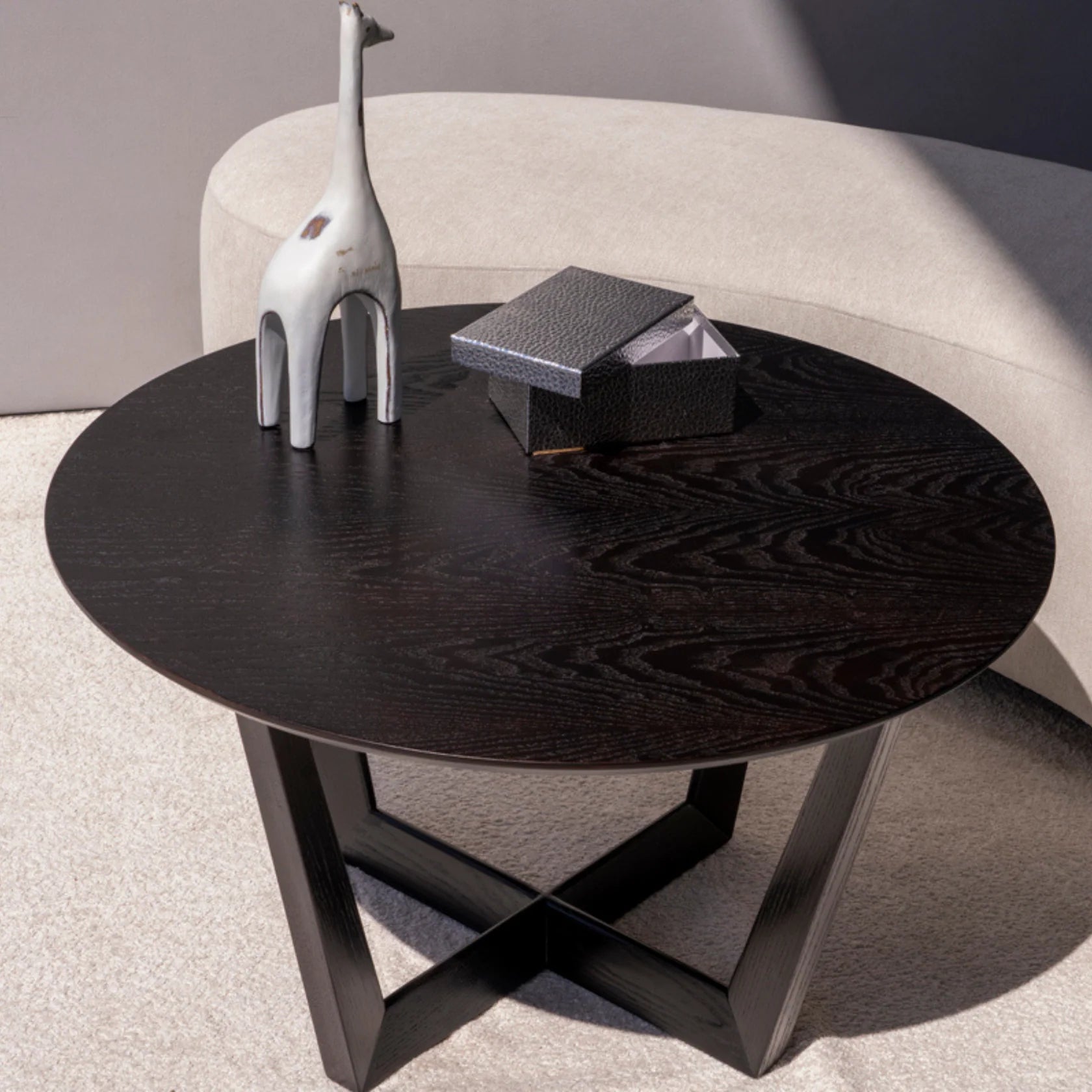 Round ash wood coffee table with sculptural base from Funky Di Andi