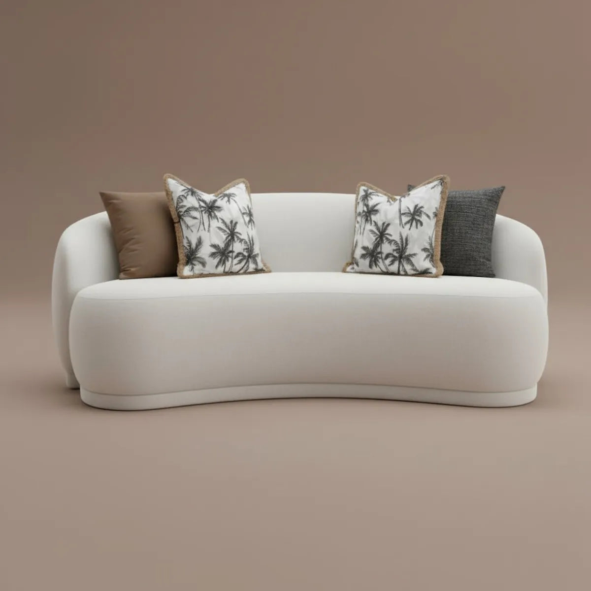 Mira Curved 3-Seater Sofa in off-white fabric, styled with decorative cushions — modern sculptural design by Casa Di Andi Dubai.